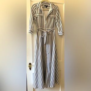Beautiful Banana Republic dress. White with navy blue stripes.